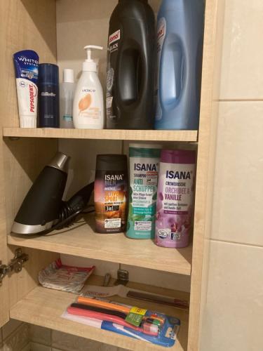 a shelf with some items on it in a bathroom at Find for the traveler in Tallinn