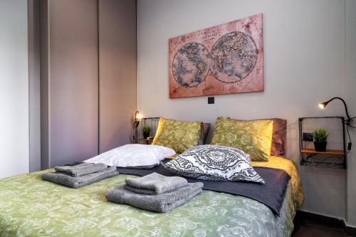 A bed or beds in a room at New Apartment in the Heart of Plaka