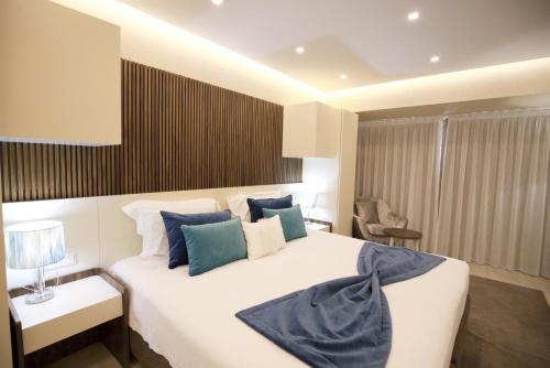 Una cama o camas en una habitación de Hotel Lido