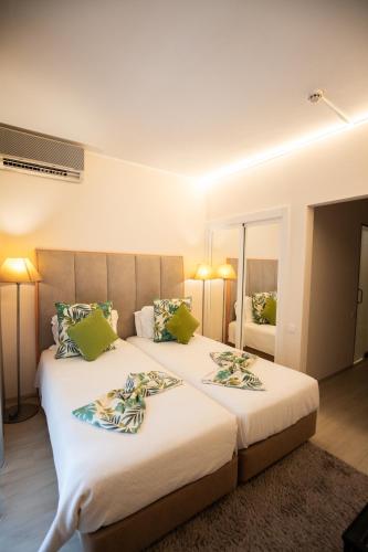 Una cama o camas en una habitación de Hotel Lido