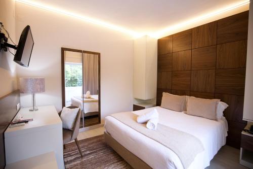 Una cama o camas en una habitación de Hotel Lido