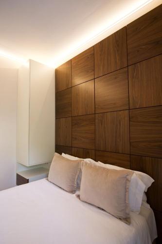 Una cama o camas en una habitación de Hotel Lido