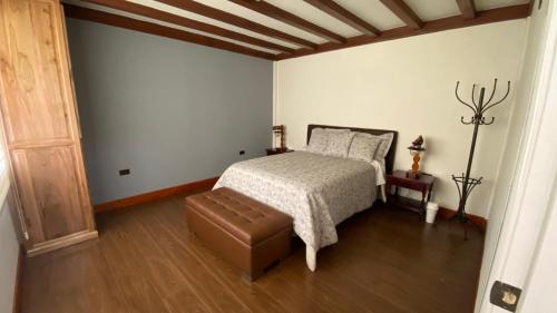 Postel nebo postele na pokoji v ubytování Departamentos Casa Río