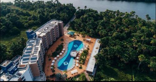 una vista aérea de un hotel con piscina en Gran Lençóis Flat Barreirinhas APT 510, en Barreirinhas