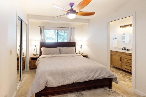 a bedroom with a bed and a ceiling fan at Pine Perch in Truckee