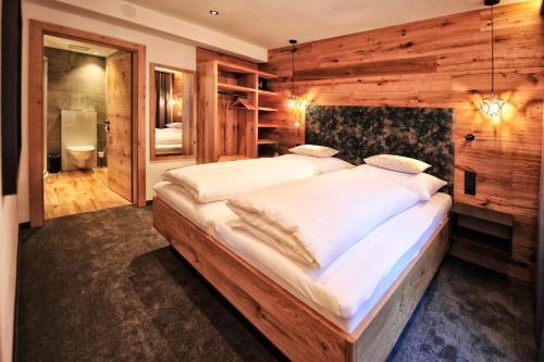 Katil atau katil-katil dalam bilik di A4 AlmA Alpin Appartments