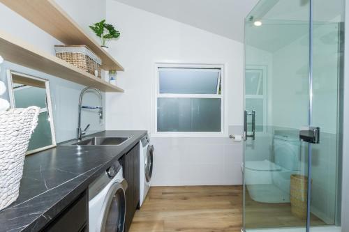 Koupelna v ubytování Corokia Villa