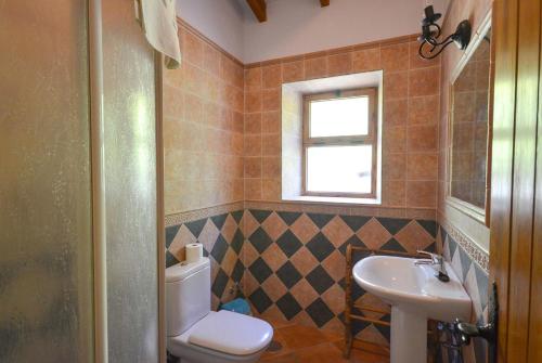 Ett badrum på Cortijo Lomosol