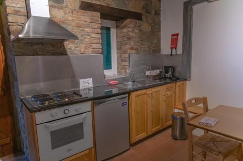 Kuchyň nebo kuchyňský kout v ubytování Farmakas Living
