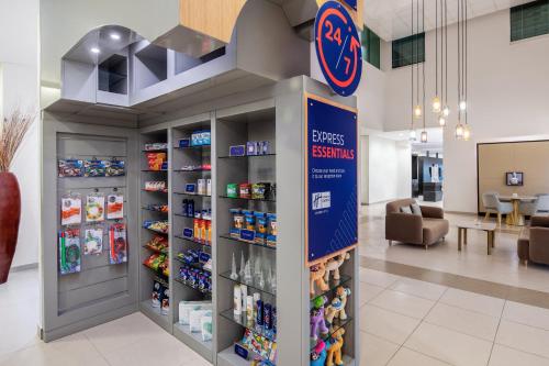 a pharmacy aisle with a pharmacyacistacistacistacistventoryventory at Holiday Inn Express Dubai, Jumeirah by IHG in Dubai