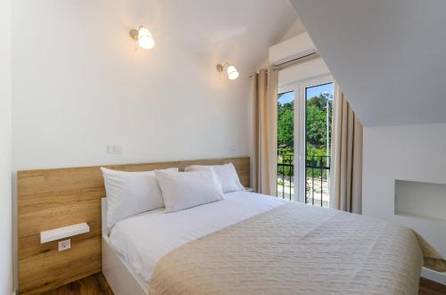 En eller flere senge i et værelse på PALACE PAULINA A