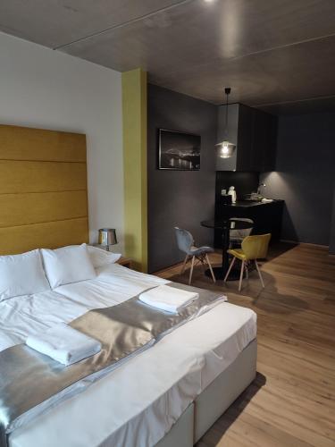 Postel nebo postele na pokoji v ubytování OPÁL Residence Apartman