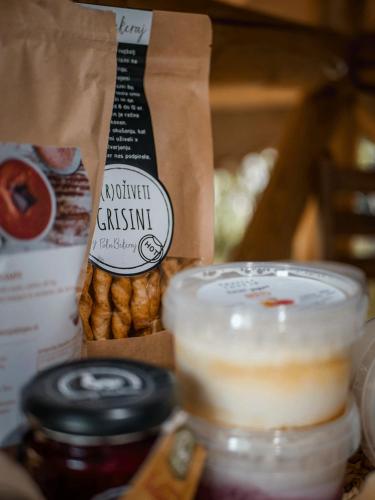 a bag of doughnuts and a cup of coffee at Vintage tent at the Lovsin Estate in Metlika
