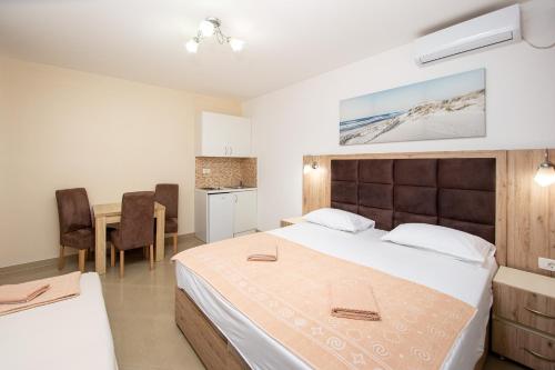 Posteľ alebo postele v izbe v ubytovaní Apartment Sofija