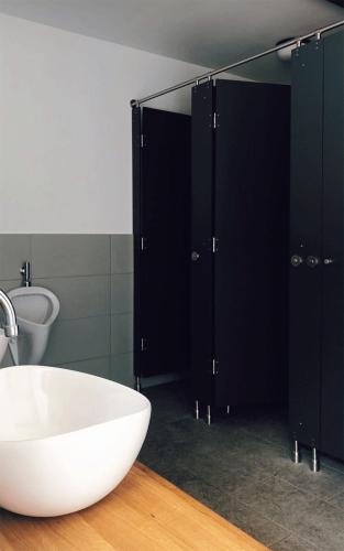 a bathroom with a white tub and a sink at Vintage tent at the Lovsin Estate in Metlika