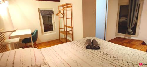 Кровать или кровати в номере ENTRE AIX ET MARSEILLE - Petite maison à Auriol