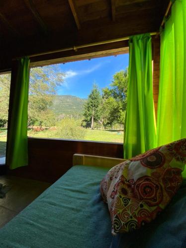 Una cama o camas en una habitación de Riberas del Azul