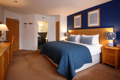 Un pat sau paturi într-o cameră la Broad Bay House