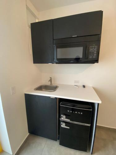Una cocina o zona de cocina en Hotel Nest