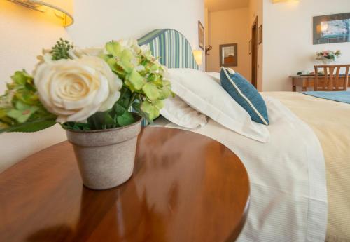 Cama o camas de una habitación en Hotel Al Terra Di Mare