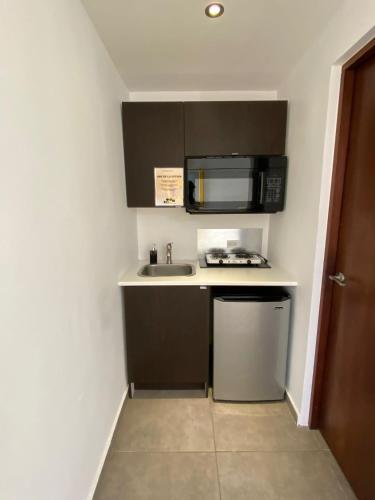 Una cocina o zona de cocina en Hotel Nest