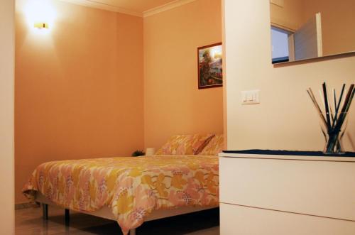 Ein Bett oder Betten in einem Zimmer der Unterkunft Midway House Italy