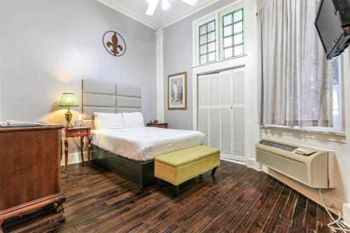 Ένα ή περισσότερα κρεβάτια σε δωμάτιο στο Rathbone Mansions New Orleans