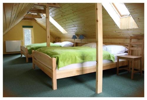 Postel nebo postele na pokoji v ubytování Krokus