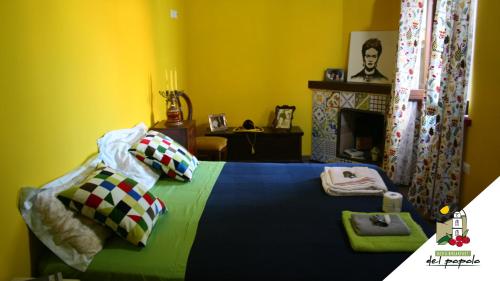 เตียงในห้องที่ Bed & breakfast del Popolo
