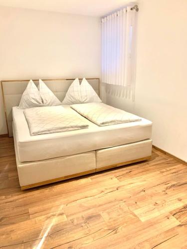Postel nebo postele na pokoji v ubytování Ena Appartements