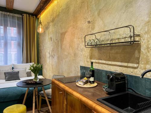 Kuchyňa alebo kuchynka v ubytovaní Stylowy apartament Wabi Sabi z Smart tv