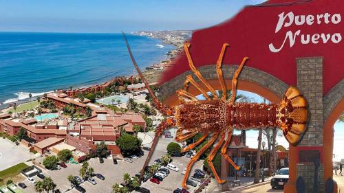 a large inflatable spider on the side of a building at Puerto Nuevo Baja Hotel & Villas in Rosarito