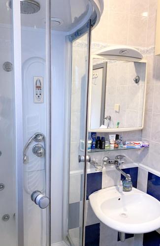 Ванна кімната в Bueno Apartment