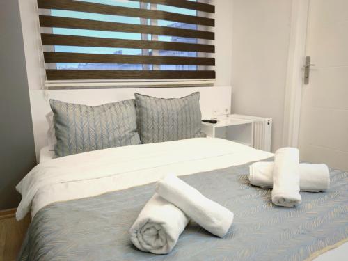 Posteľ alebo postele v izbe v ubytovaní Olen Altunizade Hotel