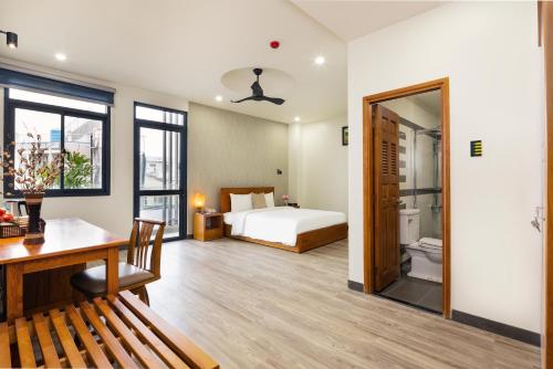 Postel nebo postele na pokoji v ubytování LARA HOTEL LONG XUYÊN
