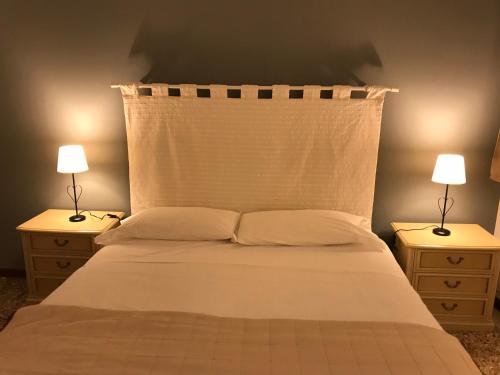 Venice and Venice Apartments - private rooms in shared apartmentにあるベッド