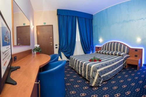 Postel nebo postele na pokoji v ubytování Motel Cuore Gadesco - Hotel - Motel - Cremona - CR