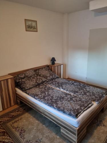 a large bed in a room with at FeWo Teusch Top1 in Arnoldstein