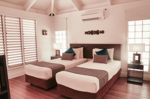 Ліжко або ліжка в номері Villa Oasis - PARADISE - MALOLO LAILAI - FIJI