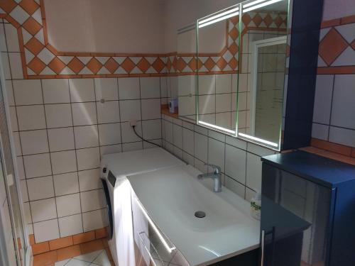 Ένα μπάνιο στο Ferienhaus Gero