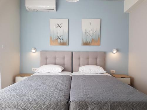 Postel nebo postele na pokoji v ubytování Tamaris Homes