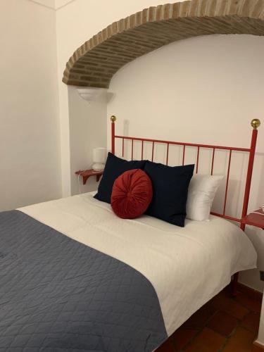 Uma cama ou camas num quarto em Às Portas da Vila