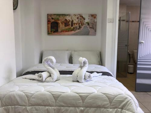 Ένα ή περισσότερα κρεβάτια σε δωμάτιο στο Hotel Room Service