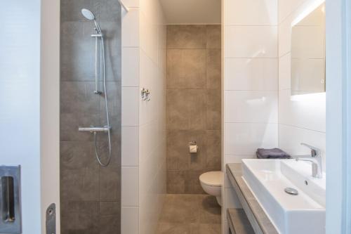 Ένα μπάνιο στο Bed & Parking Burght van Texel