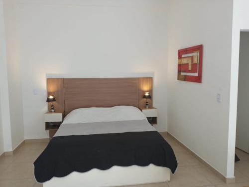 Postel nebo postele na pokoji v ubytování BA Apartment