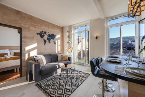 A seating area at Le Balcon Annécien 4 - rooftop view for 2-4 people