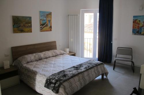 Säng eller sängar i ett rum på Kasamare apartments