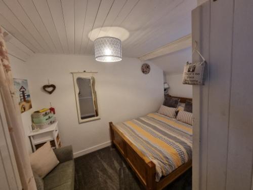 Lova arba lovos apgyvendinimo įstaigoje TY Kate cosy cottage