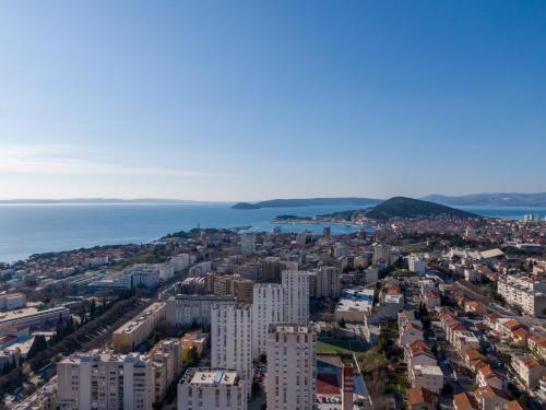 an aerial view of a city and the ocean at Hostel Elli in Split
