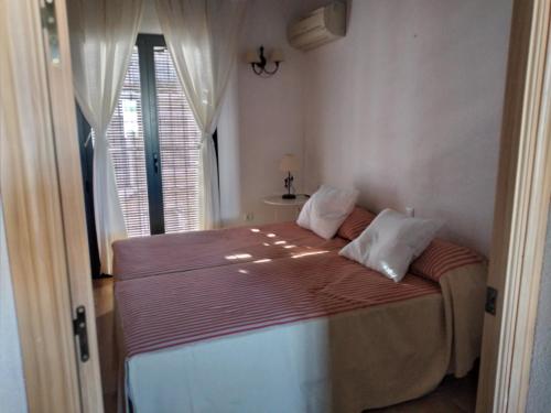 Postel nebo postele na pokoji v ubytování Ferienhaus Casa Ela Pedro - Hinojos 4 Zi - 8 Betten, Kinder Willkommen